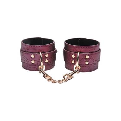 Handfesseln mit Stickereien in Violett
