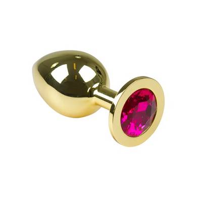 Goldener Buttplug mit pinkfarbenem Kristall