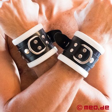 Schwarz / Weiße Bondage Handfesseln aus Leder
