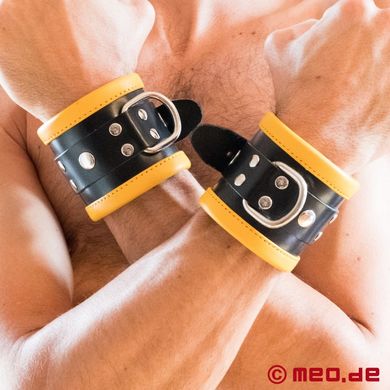 Schwarz / Gelbe Bondage Handfesseln aus Leder