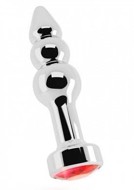 silberner-plug-mit-rotem-saphir